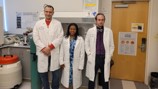 320x180 science_Icorps2b a photo of three people in a lab wearing lab coats