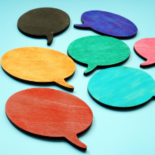 Additional Information LLC 222x222 Image of multicolor wooden speech bubbles.