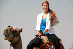Travel Image of a woman on a camel.