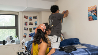Decorating-dorm-room-320x180 Image of two students decorating a dorm room