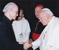 Rev. Dr. Lawrence E. Frizzell with Pope Saint John Paul II Rev. Dr. Lawrence E. Frizzell with Pope Saint John Paul II