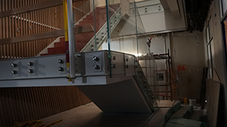 Renovation progress of the interior staircase that leads to the upper floors of Walsh Library. Innovation Hub staircase