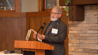 CEHS Interim Dean, Joseph Martinelli, Ed.D., CEHS Interim Dean, Joseph Martinelli, Ed.D., addressing the audience of alumni, students, staff and friends of the college.