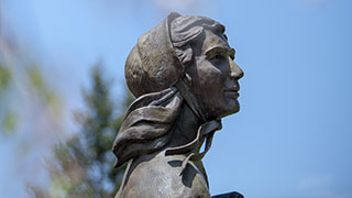 A photo of a statue of Elizabeth Ann Seton at Seton Hall University