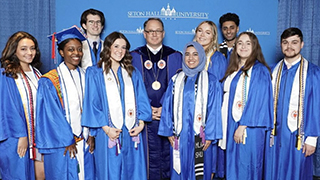 President Nyre with Members of the Class of 2022 320px President Nyre with Members of the Class of 2022