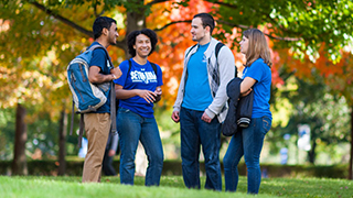 Students standing on campus