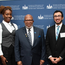Ambassador Dennis Francis and Seton Hall diplomacy students Photo of His Excellency Mr. Dennis Francis, President of the 78th Session of the United Nations General Assembly with two diplomacy students