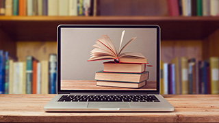 books screensaver and laptop