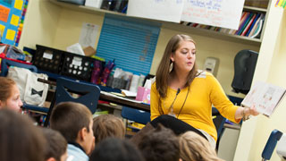 Teaching a classroom of students Teaching in a classroom of students