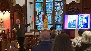 Brother Mickey McGrath, OSFS, describing his works