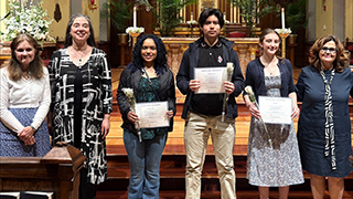 Ines Murzaku (right) with essay competition winners