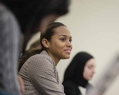 Female Seton Hall student in class