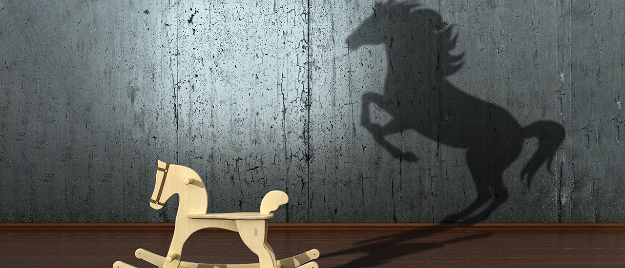 Rethinking Potential A photo of a rocking horse with a stallion shadow representing hidden potential.