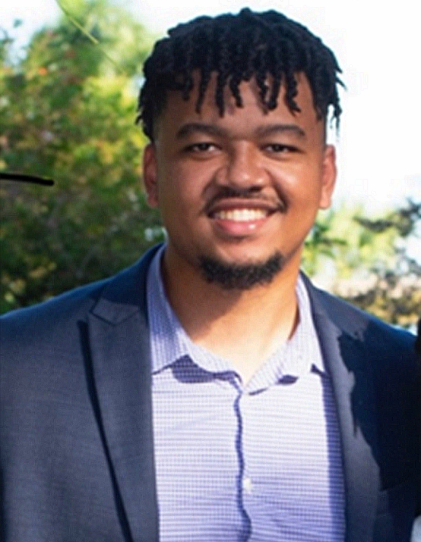 A headshot of SHU student Kamron Philpart