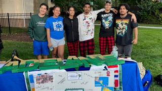 latino-institute-club-on-the-green Adelante club out on the green for the involvement fair