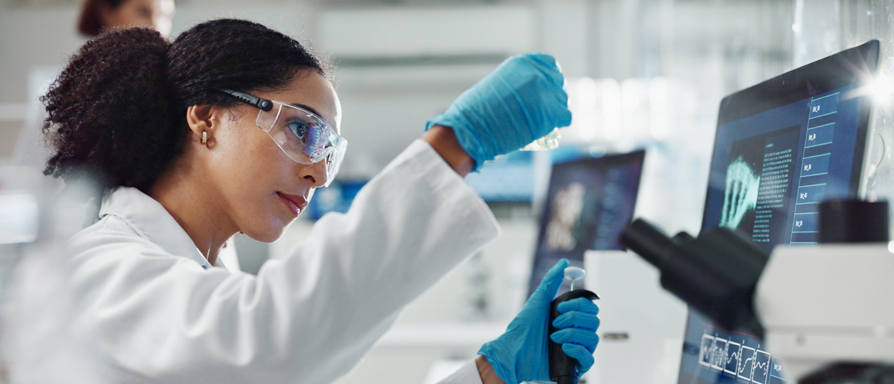 The Honest Edge A person doing research in a lab.
