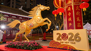 statue of a horse near a 2026 sign