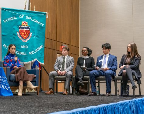 An image of Nadia Murad on stage