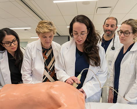 Nurse practitioners learning advanced skills at Immersions.