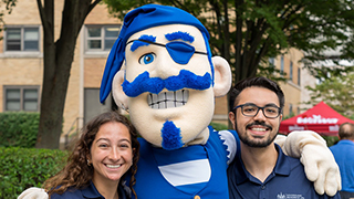 Pirate mascot with resident assistant Pirate mascot with resident assistant