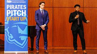 Pirates pitch attendees on stage