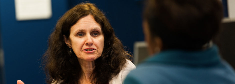 Professor talking with a student.