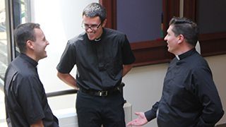 Theology students talking on the Seton Hall Campus
