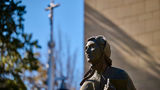 A statue of Elizabeth Ann Seton in front of Jubilee Hall.