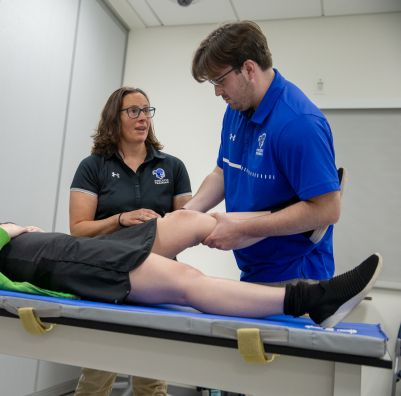 SHU athletic training student and faculty member chat