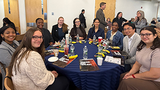 Social work students seated at conference
