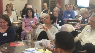 stcatherineretreatx320 Image of a woman asking a question at the St. Catherine retreat