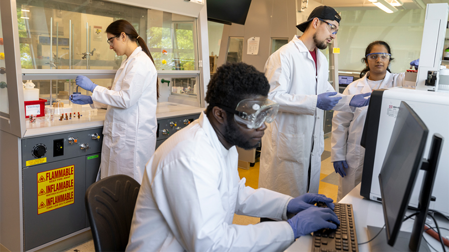 Biology students conducting research in a Seton Hall lab.