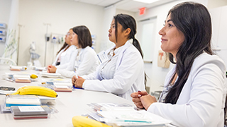 Women in Healthcare Students in a classroom.
